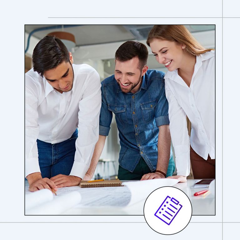 work colleagues collaborating at a desk