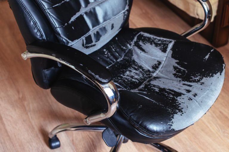 Old Worn Black Office Chair damage