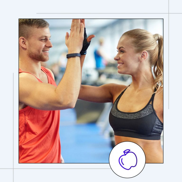 active man and woman high fiving