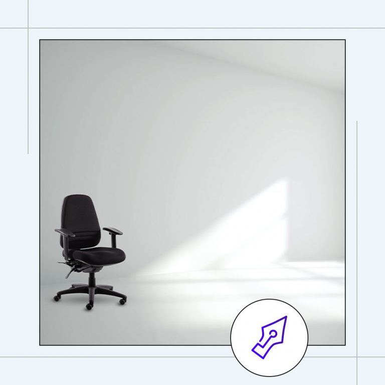 a singular ergonomic chair sitting inside a minimal office space