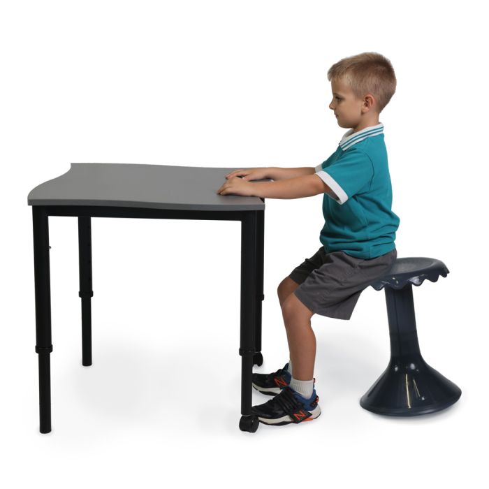 student at desk with charcoal happy stool 1000 x 1000