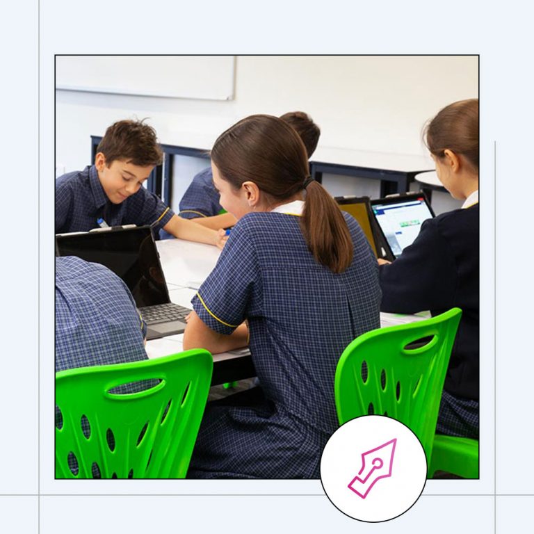 school children working in a small classroom